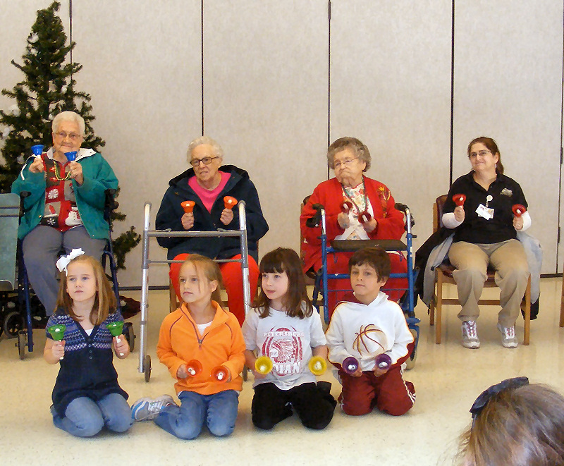 residents of Amber Manor learn a new song with first graders at Petersburg Elementary.jpg